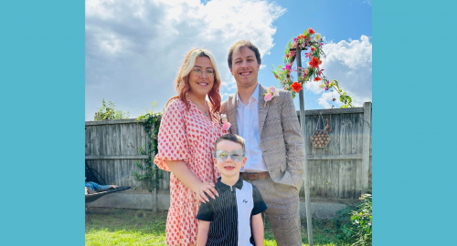 Known Egg Donor Max stands with her partner and son